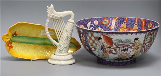 A Belleek porcelain model of a harp, circa 1920, a Carltonware dish and a modern famille rose bowl